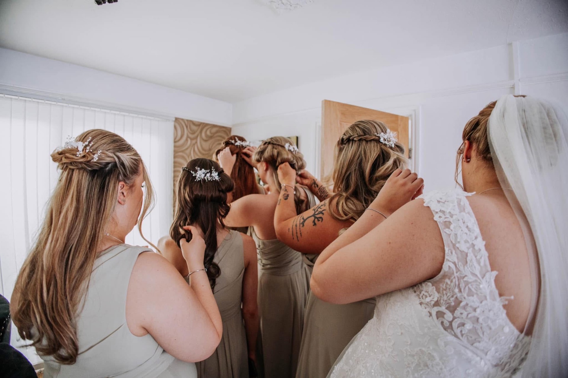 Bridesmaids getting ready together